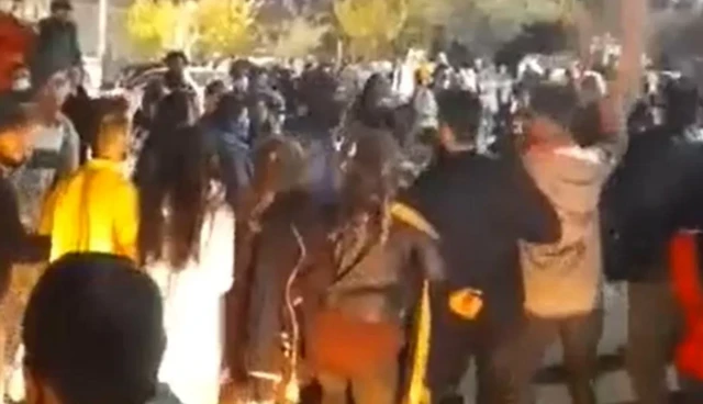 A crowd celebrated the Iranian football team's loss by dancing to music in the north-western city of Sanandaj