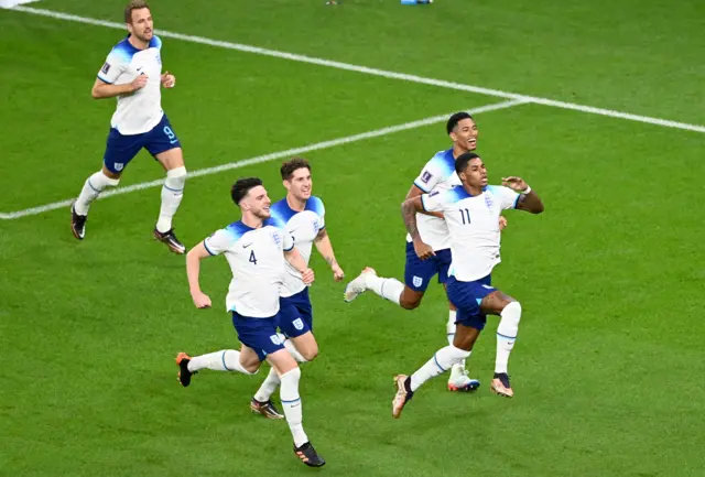 Marcus Rashford leads the England celebrations