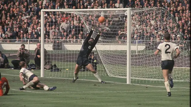 Geoff Hurst's strike bounces down off the crossbar