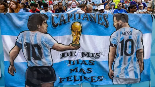 Banner showing Diego Maradona and Lionel Messi