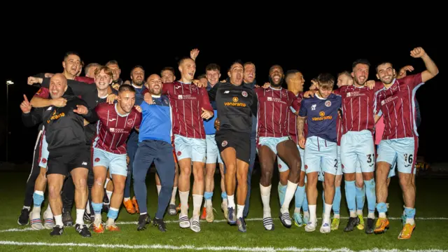 Taunton Town players celebrate their FA Cup win over Yeovil Town