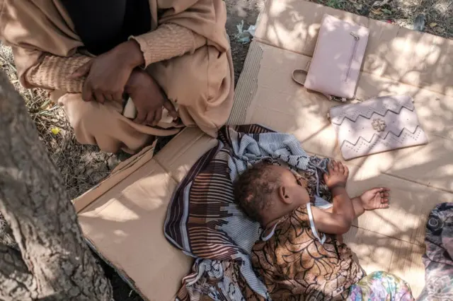 A child sleeps on a cardboard in Afar region, Ethiopia.