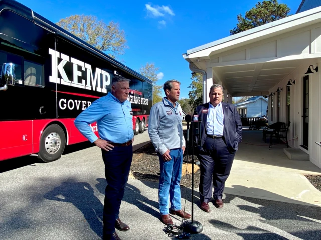 Photo of Chris Christie and Brian Kemp outside a Kemp for Governor campaign bus in Georgia