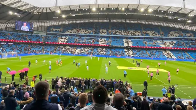 Erling Haaland emerges to join the City warm-up