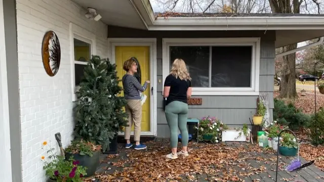 Beth Kuhn and Kat Hamm, volunteers canvassing around Louisville on Saturday morning