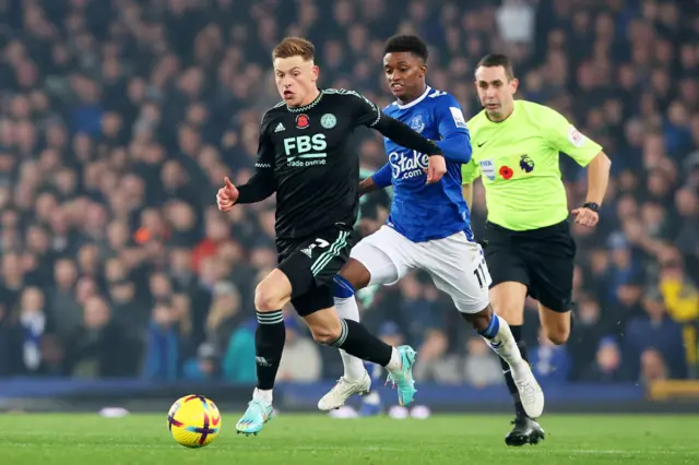 Harvey Barnes is put under pressure by Demarai Gray