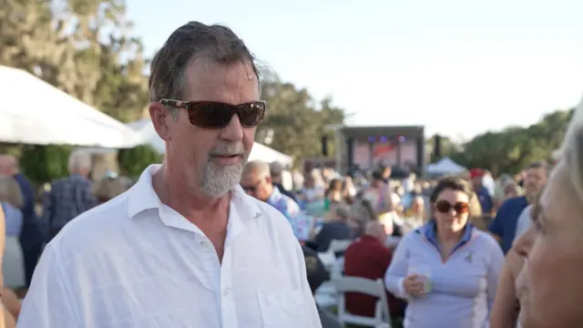 Brian pictured speaking to Sarah Smith at the Georgia Shrimp and Grits festival