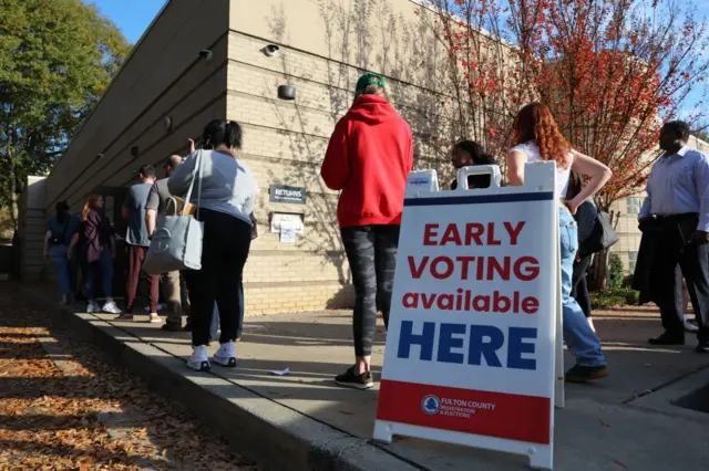 Georgia midterm voters wait to cast early votes in election