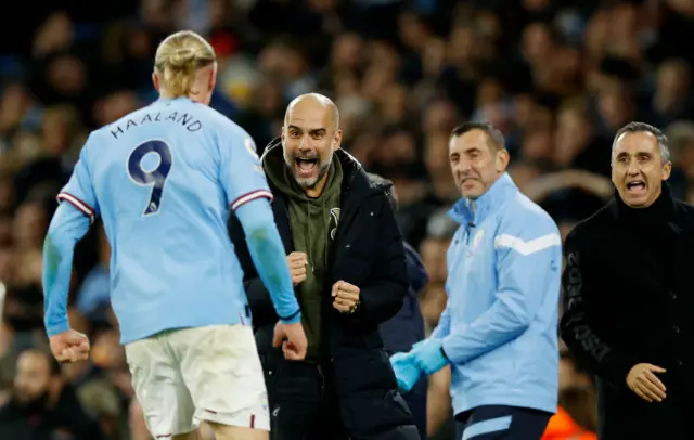 Erling Haaland and Pep Guardiola celebrate