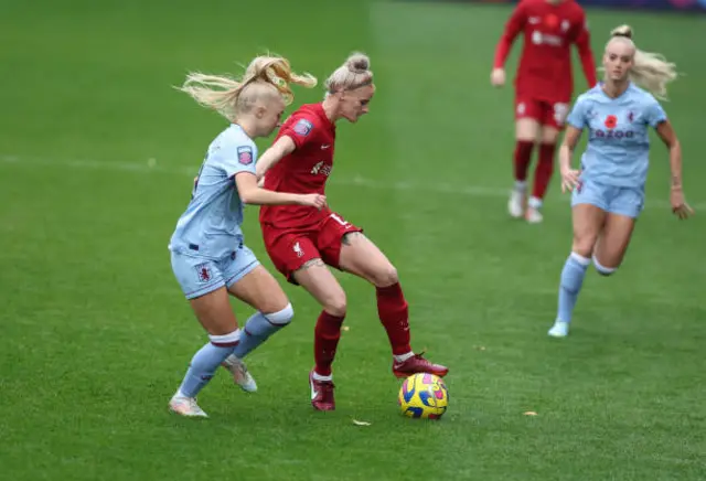 Jasmine Matthews (R) of Liverpool in action with Laura Brown of Aston Villa