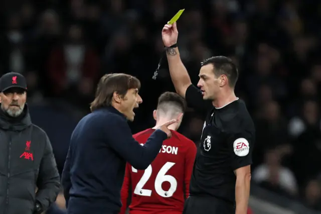 Antonio Conte getting yellow carded by the referee