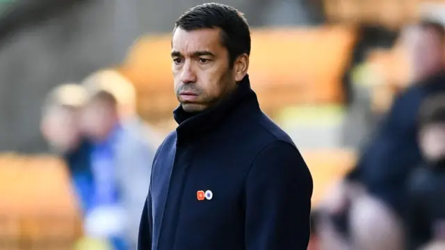 Giovanni van Bronckhorst looks deflated on the touchline