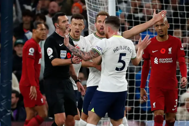 Tottenham players protest to the referee