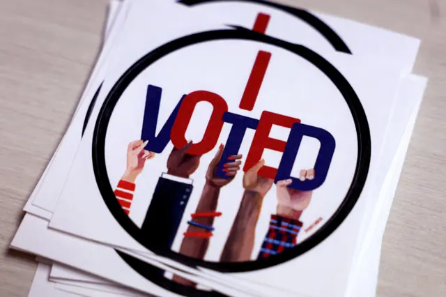 Stickers distributed to residents taking advantage of in-person absentee votings