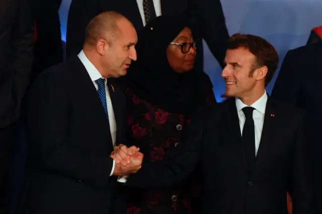 France's President Emmanuel Macron shakes hands with Bulgaria's President Rumen Radev