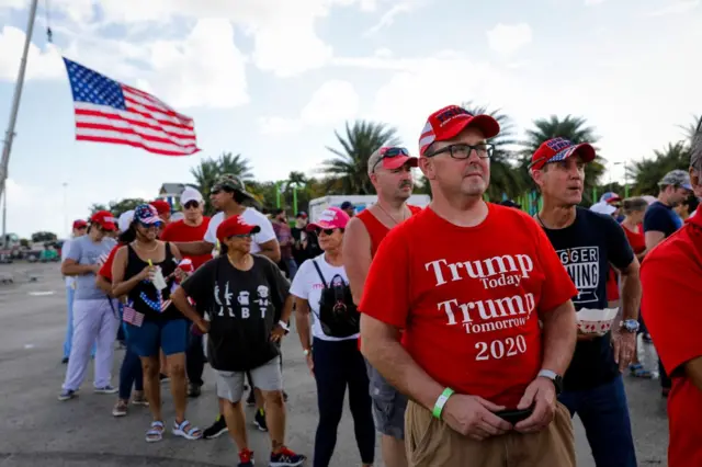 Supporters of former US president Donald Trump arrive for a "Save America" rally in Miami on Sunday