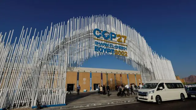 Participants walk outside the Sharm el-Sheikh International Convention Centre ahead of the COP27 climate summit