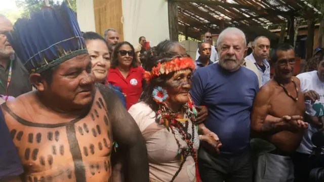 Brazil's president-elect Lula meeting leaders from the Amazon's indigenous tribes during his election campaign