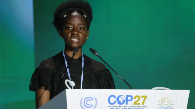 Climate activist Leah Namugerwa addressing the crowd at COP27