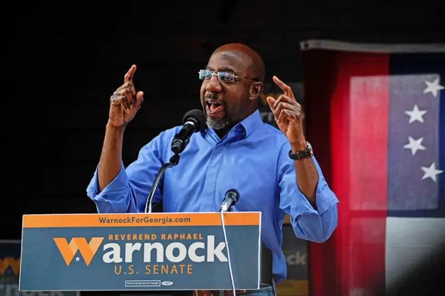 Reverend Raphael Warnock, Democratic Senator for Georgia, speaks to supporters at a midterm election rally in Macon, Georgia, US, on 7 November 2022