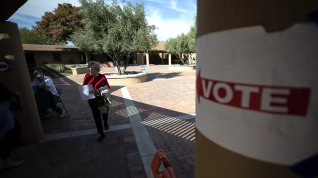 A woman goes to vote in the US midterms