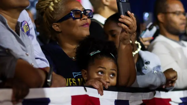 A child watching the speech