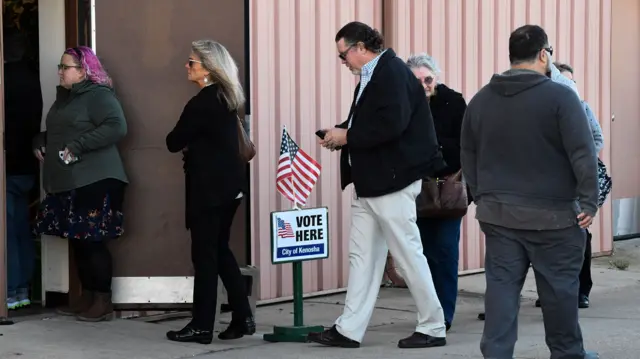 Voters wait in line