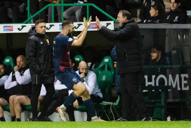 Alex Iacovitti celebrates with manager Malky Mackay
