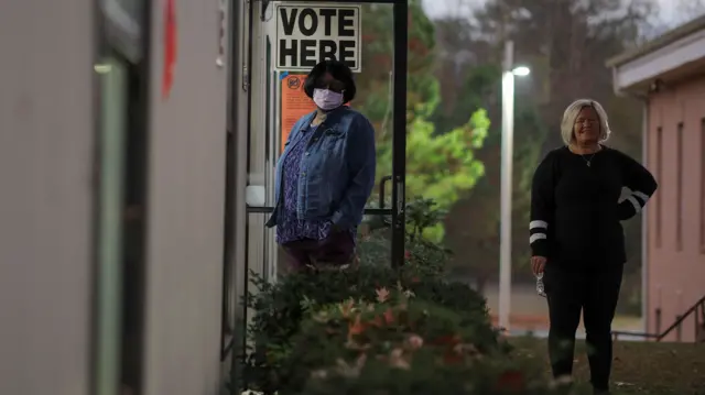 A local resident waits in line to cast her ballot during the midterm elections at Calvary Baptist Church in Austell, Georgia, U.S.,