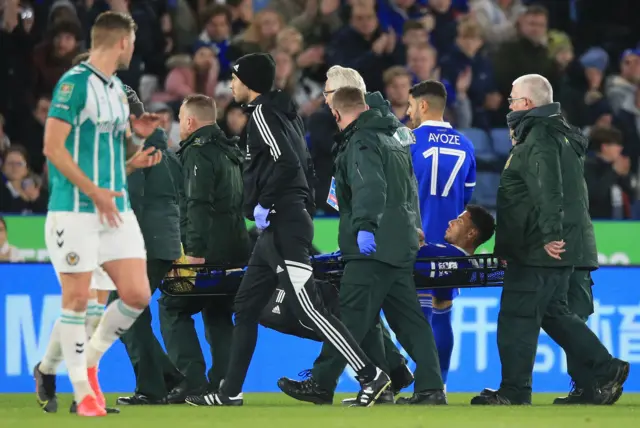 Leicester's James Justin taken off injured on a stretcher