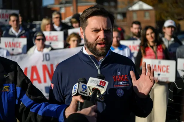 JD Vance speaking to reporters after voting