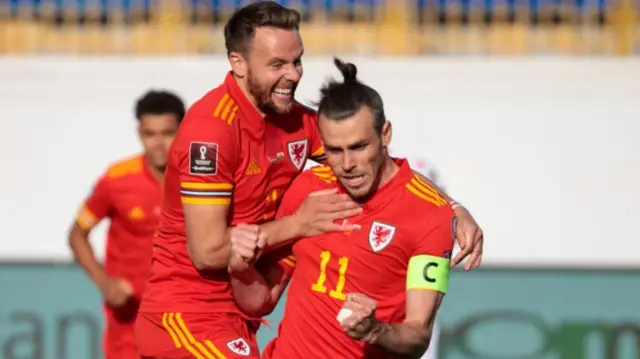 Gareth Bale and Chris Gunter celebrate