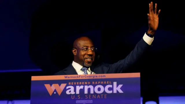 Reverend Raphael Warnock, Democratic Senator from Georgia, speaks to supporters at a U.S. midterm election night party in Atlanta, Georgia