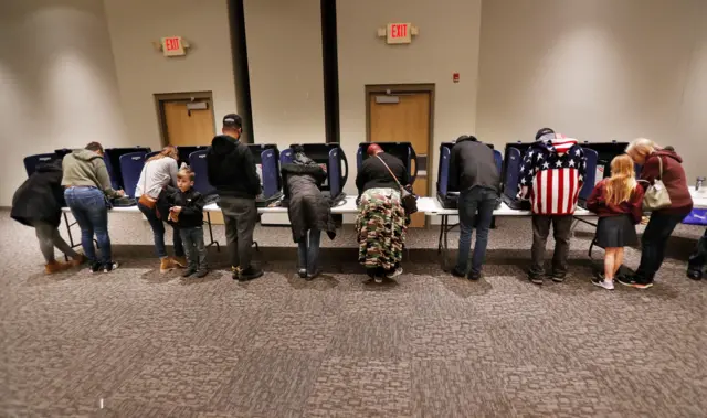 Voters cast ballots at a polling location in Youngstown