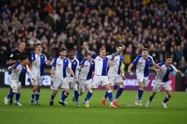 Blackburn Rovers players celebrate after beating West Ham