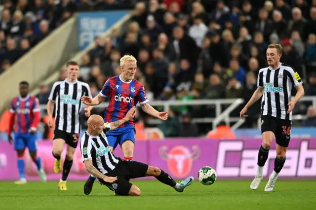 Will Hughes and Jonjo Shelvey compete for the ball