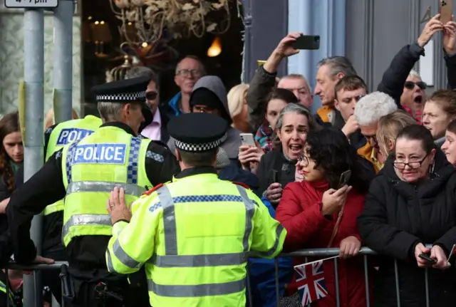 Police and crowds at Micklegate, York