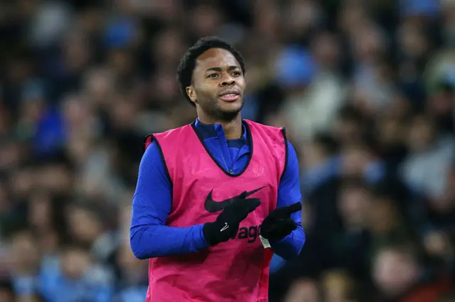 Raheem Sterling warming up