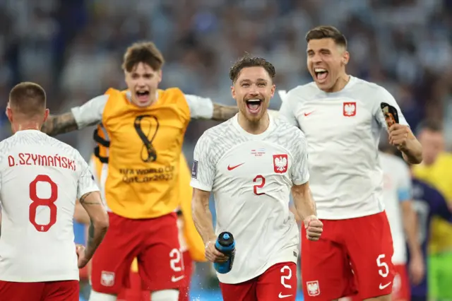 Matty Cash and Poland celebrate reaching the last 16 of the Fifa World Cup