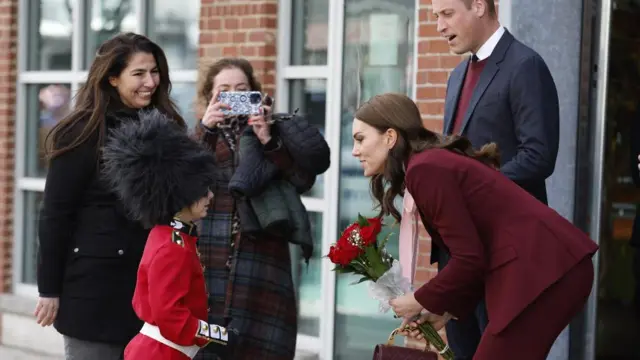 Boy dressed as a soldier meets Prince William and Catherine