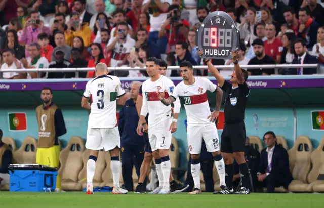 Cristiano Ronaldo and Joao Cancelo of Portugal are substituted