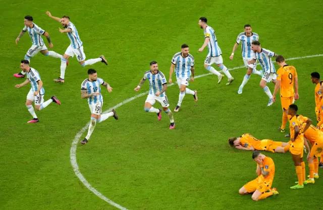 Argentina players celebrate while Dutch players look dejected