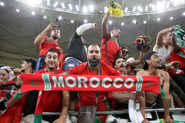 Morocco fans celebrate their team's 1-0 victory