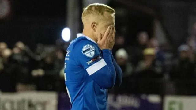 Linfield's Connor Pepper looks disappointed