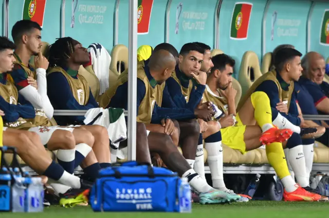 Cristiano Ronaldo and Portugal team-mates on bench