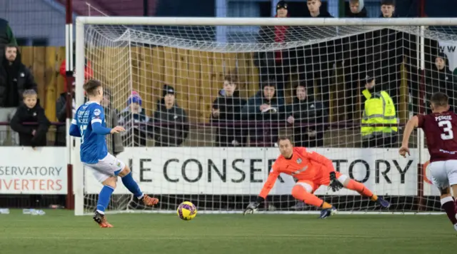 Linfield's Chris McKee scores