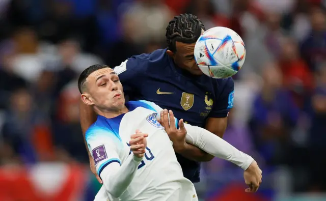 Phil Foden goes for header