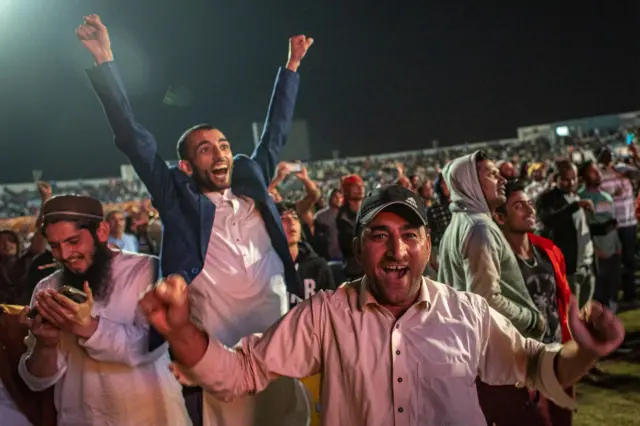 Fans celebrate in Doha