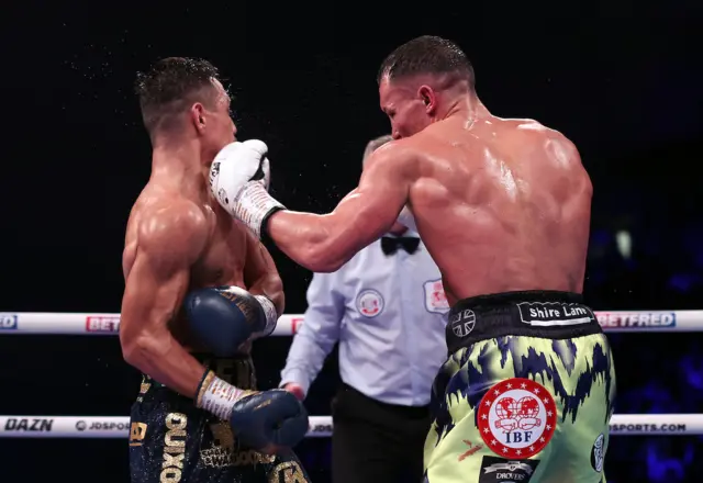 Josh Warrington lands a punch on Luis Alberto Lopez