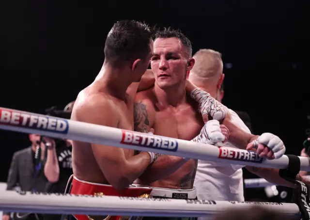 Josh Warrington is consoled by Luis Alberto Lopez